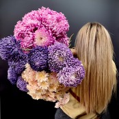 Pastel Chrysanthemums Seasonal Varieties Bouquet Florist Choice Design in tasteful wrapping.